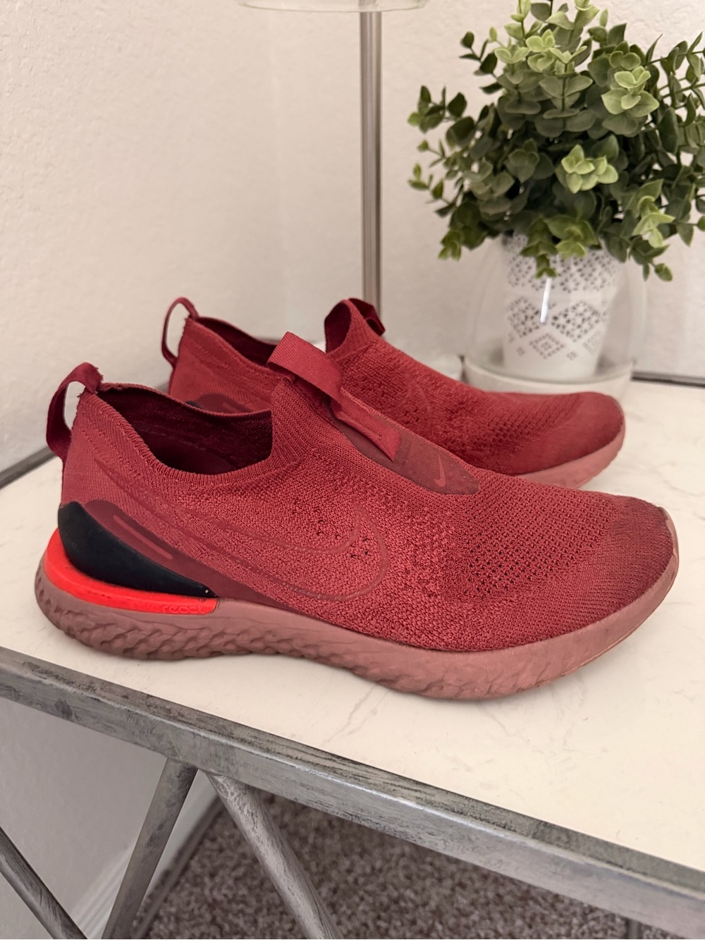 Nike Women’s Slip-On Knit Sneakers in Burgundy Red